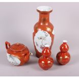 A Chinese baluster vase, decorated panels of birds and flowers, 11 3/4" high, a similar teapot and a