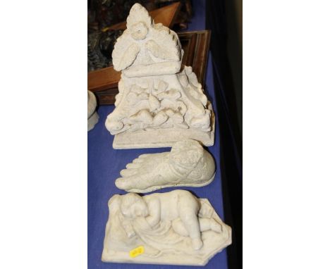 A stone Corinthian column capital (damages), a terracotta model foot and a white marble figure of a sleeping child 