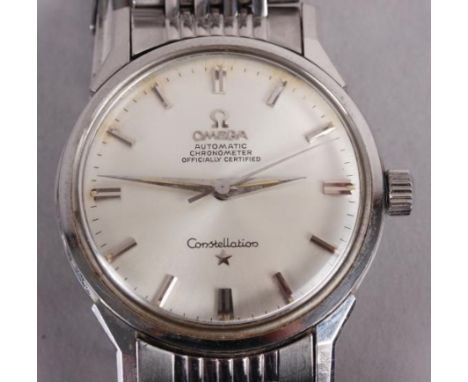 A gentleman's Omega Constellation stainless steel bracelet watch with silvered dial and baton numerals Condition, Overall goo
