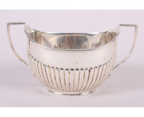 A silver two-handled sugar basin with half fluted decoration, 5.3oz troy approx 