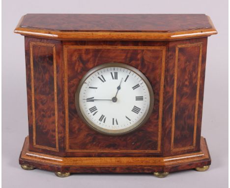 A walnut and inlaid cased mantel clock with white enamel dial 