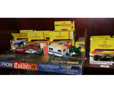 A quantity of Shell "Sportscar Collection" die-cast model vehicles, boxed and others, and an "Escape from Colditz" boardgame 