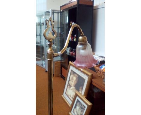 An electric lamp in brass 