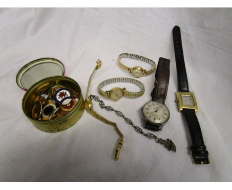 Bag of watches & tin of enamel bowling badges