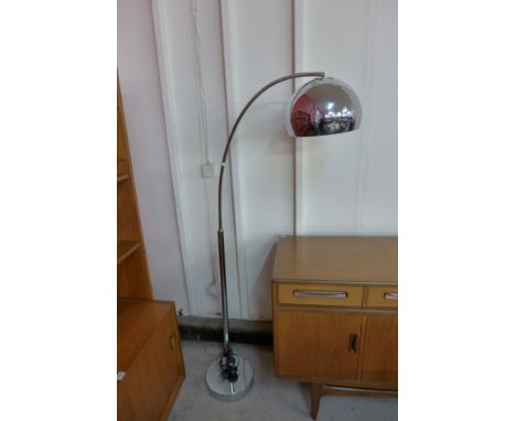 A chrome standard lamp