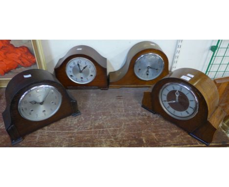 Four oak mantel clocks