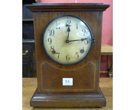 A 19th Century American beech shelf clock