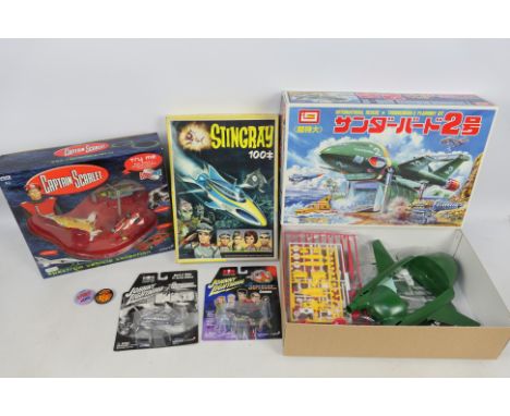 Thunderbirds - Stingray - Captain Scarlet - Johnny Lightning. A selection of Five boxed and carded vehicles, puzzle and model