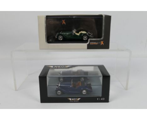 Neo - Premium X - 2 x boxed Morgan cars in 1:43 scale, a 4-4 Flat Radiator model in blue # 46235 and a 1974 4/4 model in gree
