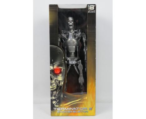 NECA - Terminator 2 - Endoskeleton. A boxed NECA made Reel Toys Terminator 2 ' Endoskeleton ' 18" action figure ' With Light 