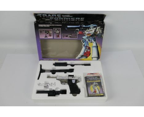 Hasbro - Transformers - A boxed Decepticon Leader Megatron dated 1984 # 5793. The model appears in Very good condition and th