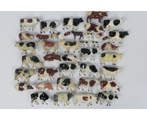 Britains - Johillco - A collection of 40 x unboxed cows and calves including standing and lying down examples. They show sign