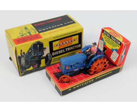 Britains - A rare boxed Fordson Power Major Diesel Tractor with spudded metal wheels # 171F. The model appears in Good condit