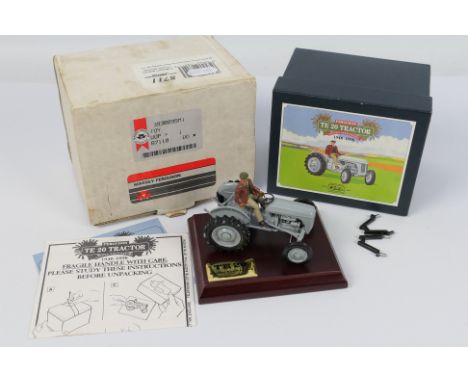 Britains - A boxed Golden Anniversary Edition Ferguson TE 20 Tractor # 8711. The model appears in Mint condition with paperwo