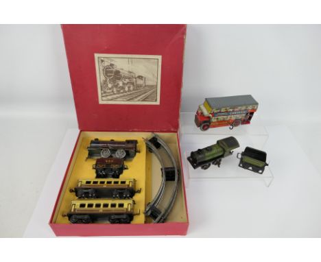 Mettoy - Wells O London - A boxed Mettoy clockwork train set in Very Good condition with a similar unbranded clockwork loco i