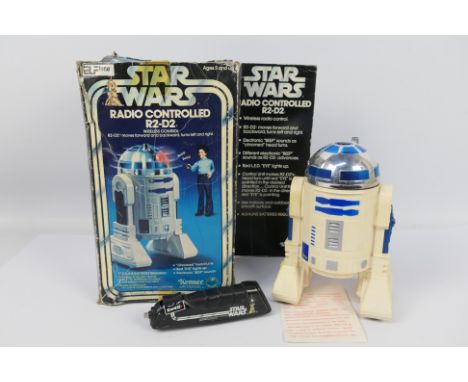 Kenner - Star Wars - A boxed Radio Controlled R2-D2 # 38430. The model shows signs of age with some yellowing on the body but