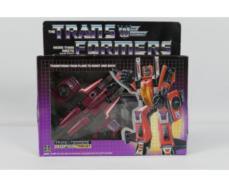Hasbro - Transformers - A boxed Transformers Decepticon Thrust # 5986/5785. The model appears in Excellent condition and has 
