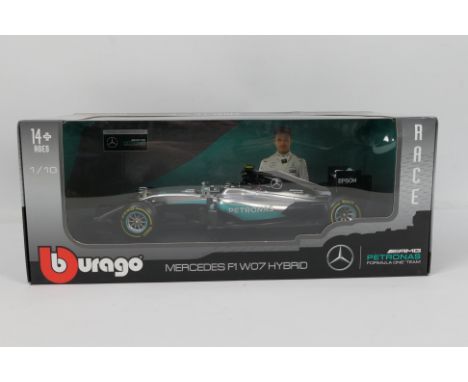 Bburago - A boxed Mercedes F1 W07 Hybrid Nico Rosberg 2016 World Drivers Champion car in 1:18 scale # 18001R. The model appea