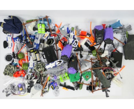 Action Man - Hasbro - A large collection of loose predominately 'Second Generation' modern Action Man accessories. Lot includ