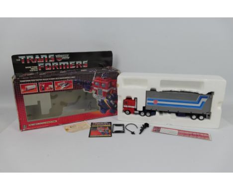 Hasbro - Takara - Transformers - A boxed Autobot Commander Optimus Prime dated 1984 # 5796. The model appears in Good conditi