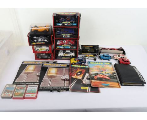 Collection of Scalextric cars Hornby, Paperwork and accessories. Including boxed cars and loose cars. The boxes are in very p