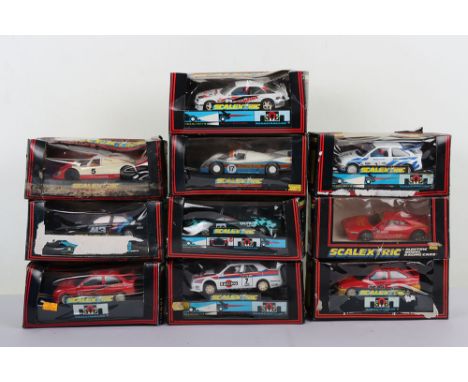 Ten Scalextric Boxed cars Hornby. Including BMW, Ford, Porsche, Jaguar, Alfa Romeo, Ferrari and more. The boxes are in very p