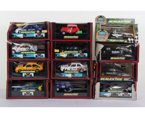 Twelve Scalextric Boxed cars Hornby. Including BMW, Mini, Mondeo, Mercedes, Mini Cooper and more. The boxes are in very poor 