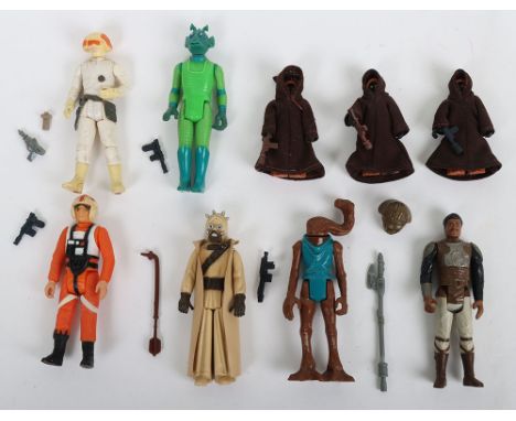 Nine loose Vintage Star Wars action figures complete Kenner. Including Hammerhead, Greedo, Tusken Raider, Luke Skywalker X-Wi