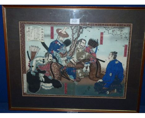 A framed and mounted oriental Print depicting Oda Nobunaga and Hideyoshi by Toyonobu Utagawa, 23 1/2" x 18 1/2".