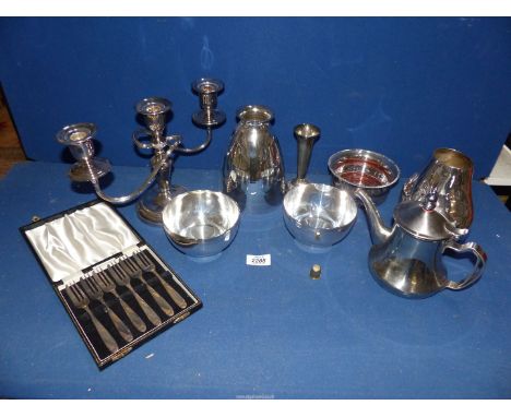 A small quantity of silver plate including candelabra, cased set of pastry forks, coaster, bud vase, etc.