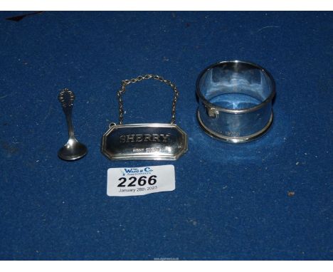 A silver Napkin Ring, Chester 1925, Sherry label dated 1984 and a silver mustard spoon, Birmingham 1900.