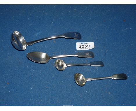 Four Georgian silver Spoons including a sauce ladle, salt spoons and a teaspoon total weight 79 gms approx.