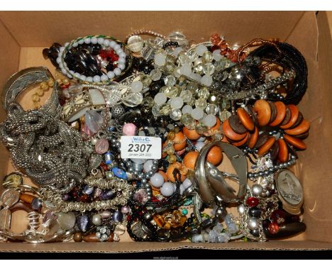 A large quantity of bangles, beaded bracelets, white metal bangle, Variety Club heart brooches etc.