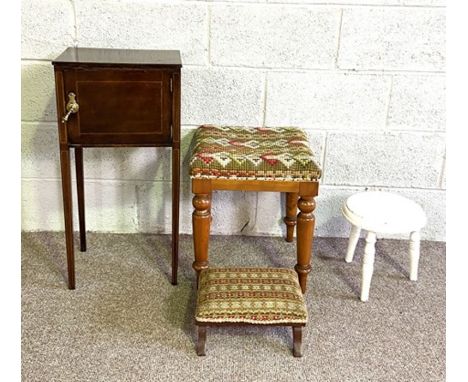 A small tapestry topped footstool, three smaller stools and a mahogany bedside pot cupboard 5)