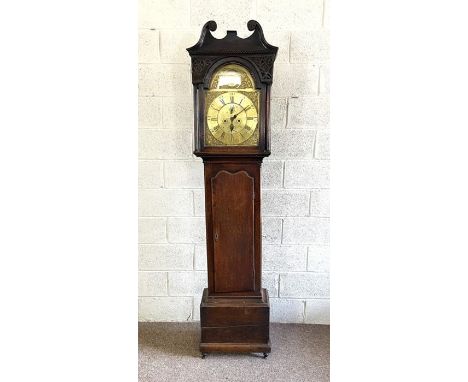 A Scottish George III provincial oak longcase clock, signed Alex.dr Dalrymple, Linlithgow, with an arched brass dial, in an a