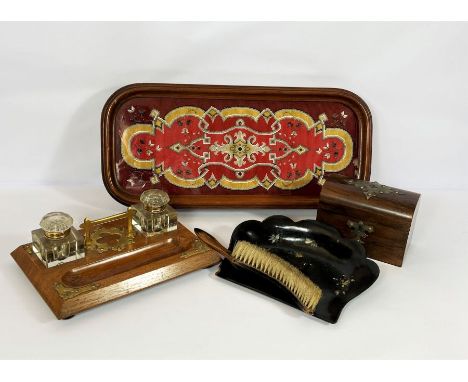 A Victorian beadwork decorated table sledge; together with a Victorian inkstand, a similar walnut tea caddy and a papier mach