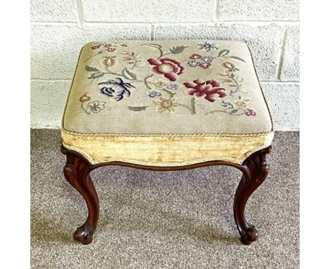 A good Victorian mahogany stool, circa 1860, with floral tapestry stuffed over seat, set on four scrolled legs, 46cm high, 54