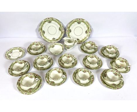 A Sutherland china tea service for twelve place settings, decorated with flowers and green bands (a lot)