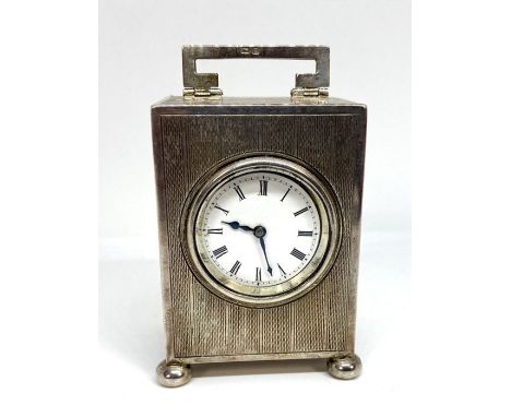 A fine silver Art Deco miniature carriage clock, hallmarked Birmingham 1922, by Adie Brothers, with a French movement, number