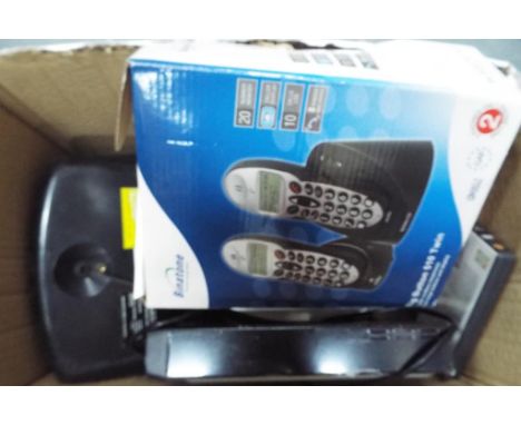 A lot to include DVD player, a Polaroid DVD player, good Milan's speaker system, phone dock and a cord less phone set This lo