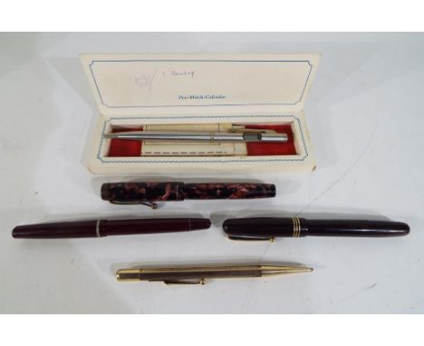 Pens - A small collection of pens to include a Mabie Todd 'Swan' self filler with 14 ct nib, an Osmiroid 75, a Mentmore Auto 