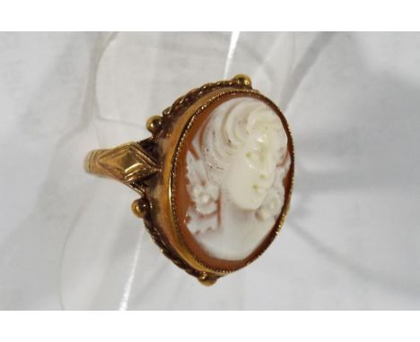 A lady's hallmarked 9 carat yellow gold cameo ring, size O, approx weight 4.71 gm (all in)   This lot MUST be paid for and co