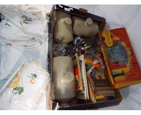 a good mixed lot to include three stoneware ceramic foot warmers, a set of CRYSELCO vintage festive lights, vintage linen, kn