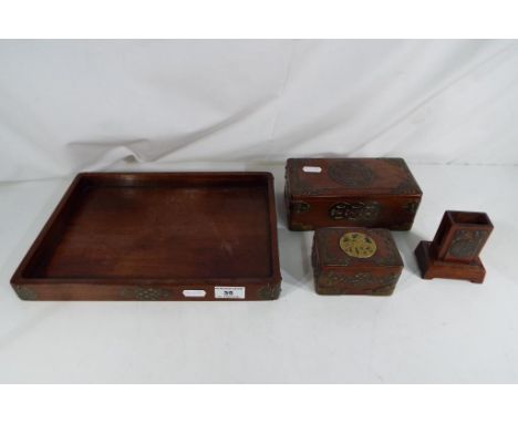 A Chinese wooden trinket box with brass mounts, a tray and similar (4)