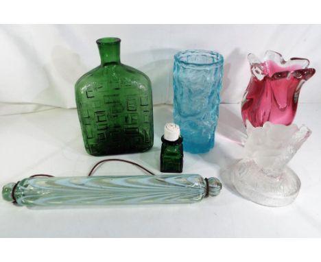 A good lot to include a glass rolling pin, Italian glass bottles, vases and similar [6]