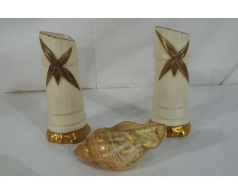 Royal Worcester - Three pieces of blush ivory Royal Worcester to include a pair of small bud vases, approximately 10 cm (h) a