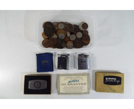 A small quantity of UK coins, both pre and post decimalisation, a boxed Zippo pocket knife, two vintage lighters comprising a