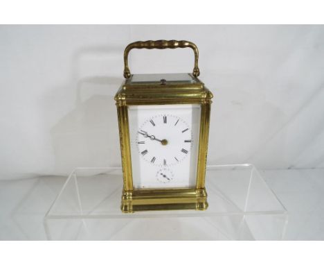 A late 19th century Gorge-cased carriage clock with grande sonnerie striking on two bells and alarm feature, white enamel dia