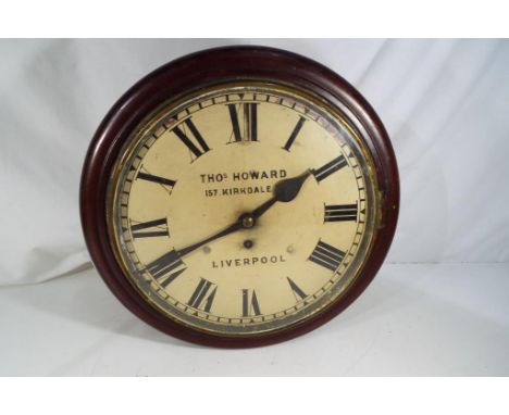 A 12 inch dial clock, the painted dial with Roman numerals and scribed Thos Howard Thos Howard 157 Kirkdale Road Liverpool (l