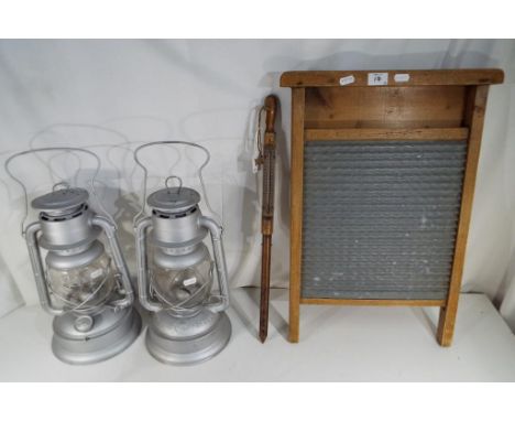 Two German Feuerhand Nr280 kerosene lamps, a vintage wash board and vintage hotbed soil thermometer (4)